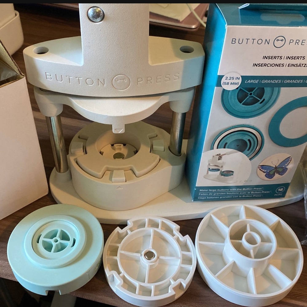 Button press machine